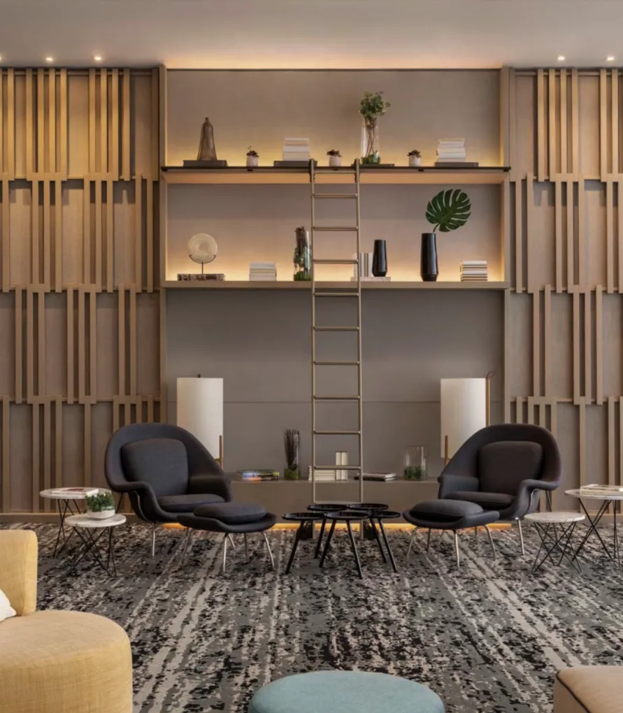 Photo of hotel lounge with fancy bookshelf